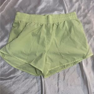 target all in motion light green/yellow active running shorts w zippered pockets